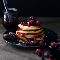 American pancakes with raspberry jam and wild berries